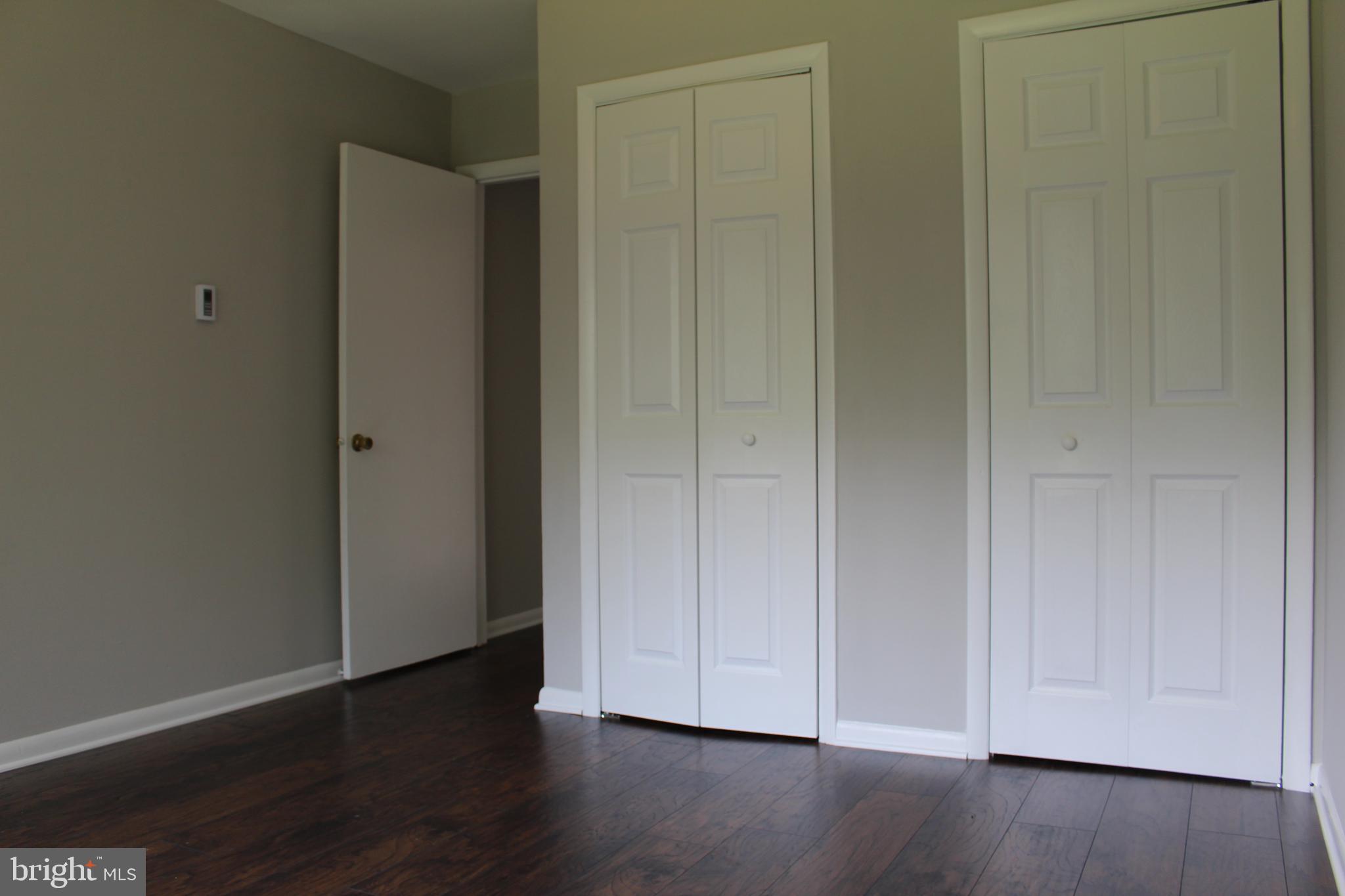 110 Griffith Road, Unit 2 Delta, PA 17314 - Photo 5 of 6 a view of empty room with wooden floor
