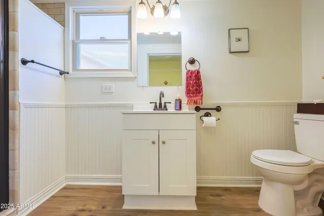 a living room with furniture a rug and a window