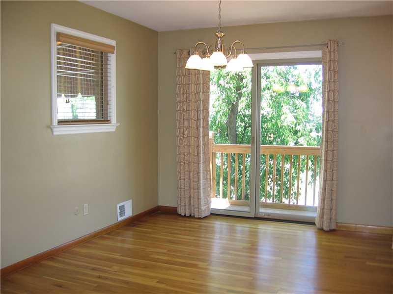 1986 Warriors Road Pittsburgh, PA 15205 - Photo 5 of 18 Dining Room. The dining room end of the open floorplan with the kitchen to the right. The patio doors lead to the deck.