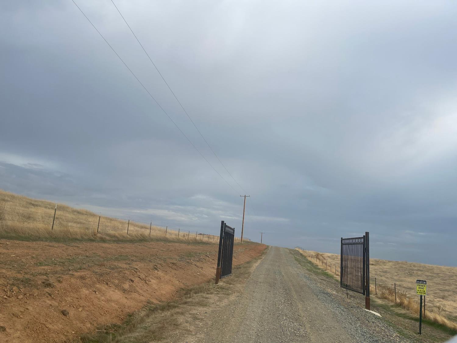 0 Hawk Trail Shingle Springs, CA 95682 - Photo 2 of 37 Trail Hawk and through the gates to property past the power pole on the left