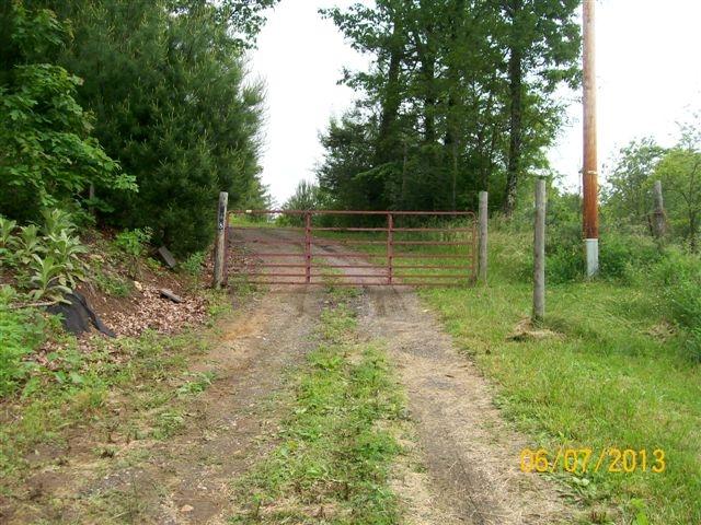 168 Wilson Cemetery Road Northeast Check, VA 24072 - Photo 13 of 14 a backyard of a house with lots of green space