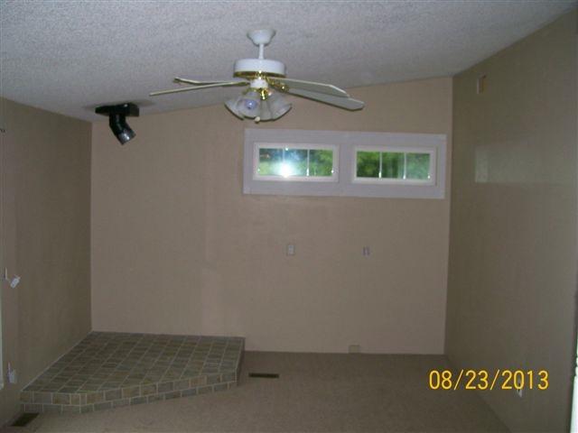 168 Wilson Cemetery Road Northeast Check, VA 24072 - Photo 5 of 14 an empty room with a window