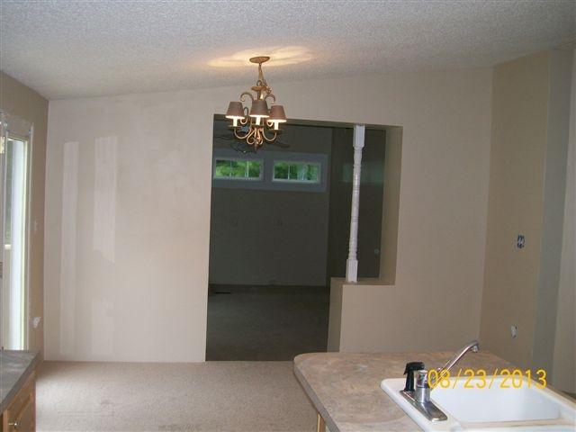 168 Wilson Cemetery Road Northeast Check, VA 24072 - Photo 6 of 14 a view of a livingroom with a kitchen