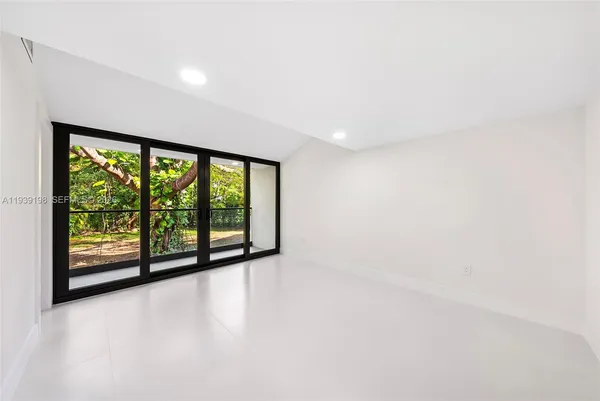 a view of a lot of a large window with an outdoor space
