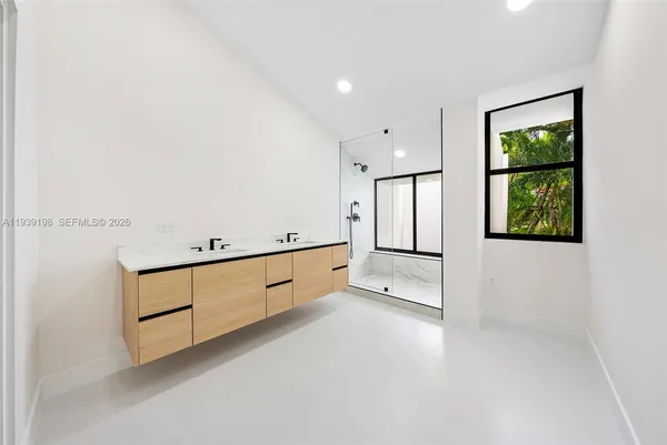 a view of a small space with wooden floor