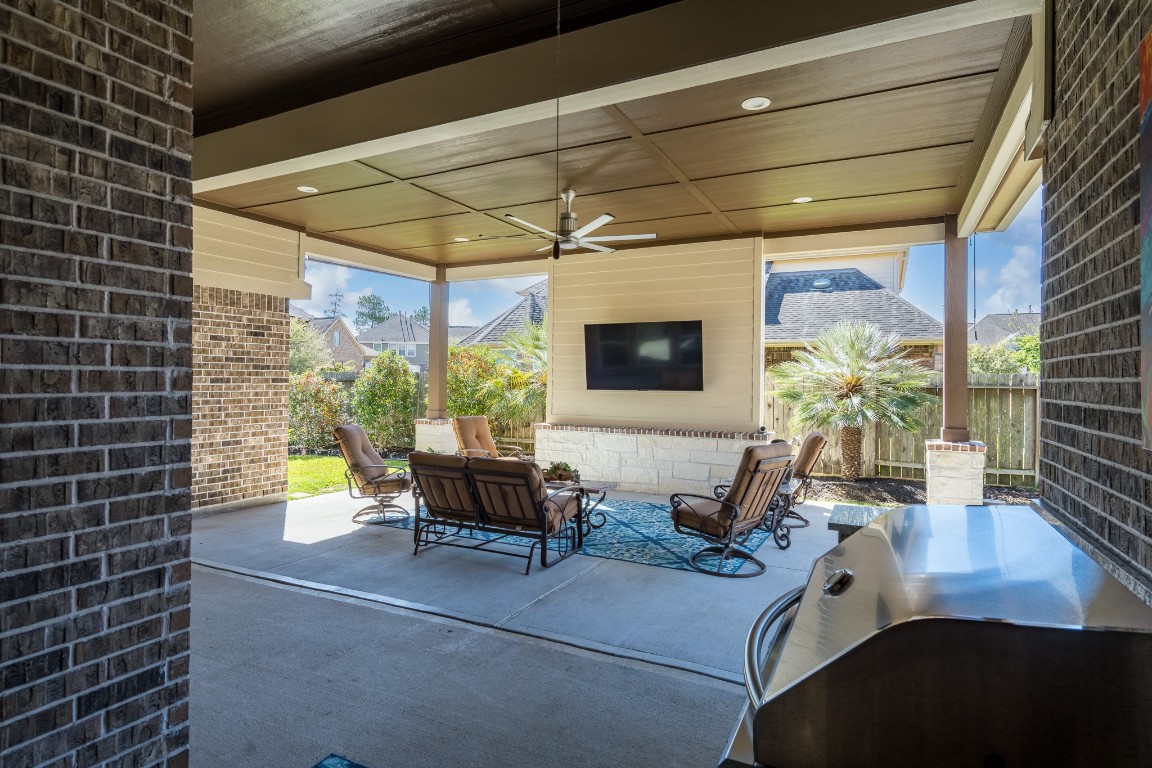 6859 Adrienne Arbor Drive Spring, TX 77389 - Photo 25 of 32 Backyard oasis with expansive covered patio