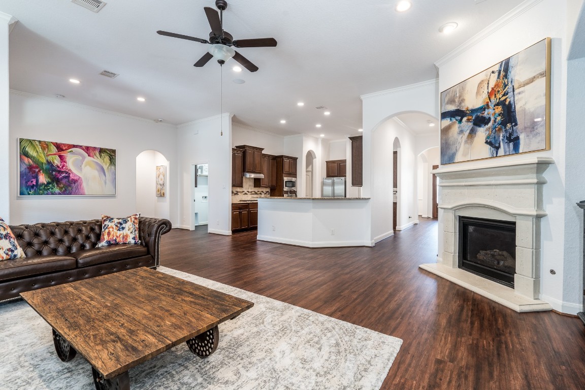 6859 Adrienne Arbor Drive Spring, TX 77389 - Photo 32 of 32 Open floor plan with the living room, breakfast area, and kitchen cohesive