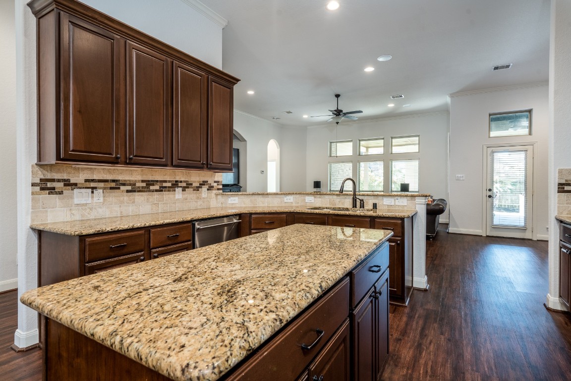 6859 Adrienne Arbor Drive Spring, TX 77389 - Photo 8 of 32 Huge kitchen area with granite counter tops, double over, and plenty of cabinets
