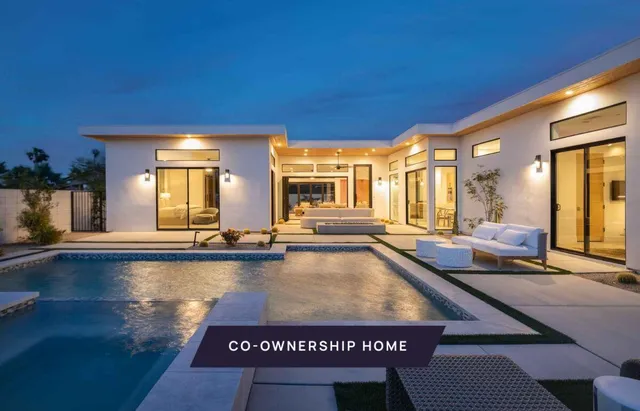 a view of swimming pool and outdoor seating