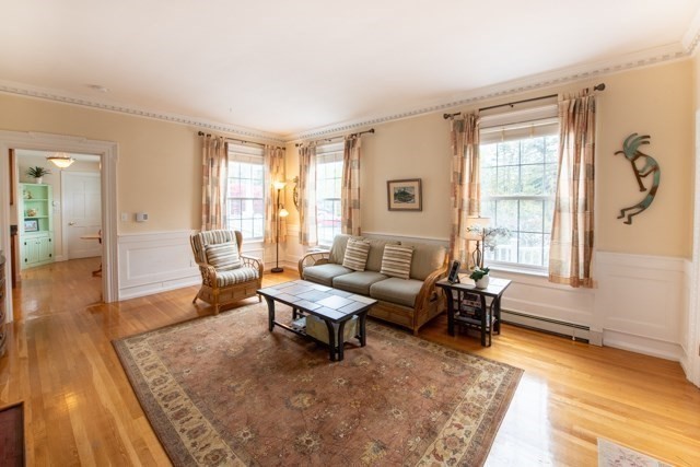 5 Porter Road, Unit 102 Andover, MA 01810 - Photo 9 of 26 a living room with furniture and a window