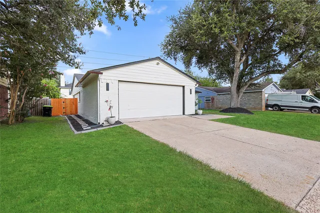 an aerial view of residential house with outdoor space