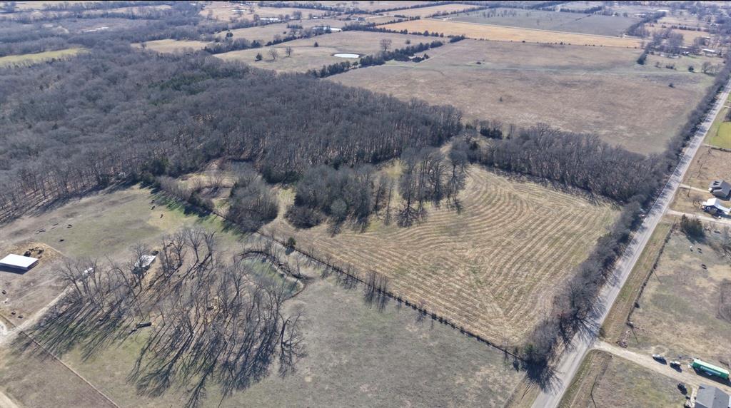 0 Fm 1498 Paris, TX 75462 - Photo 9 of 15 a view of a dry yard with wooden fence