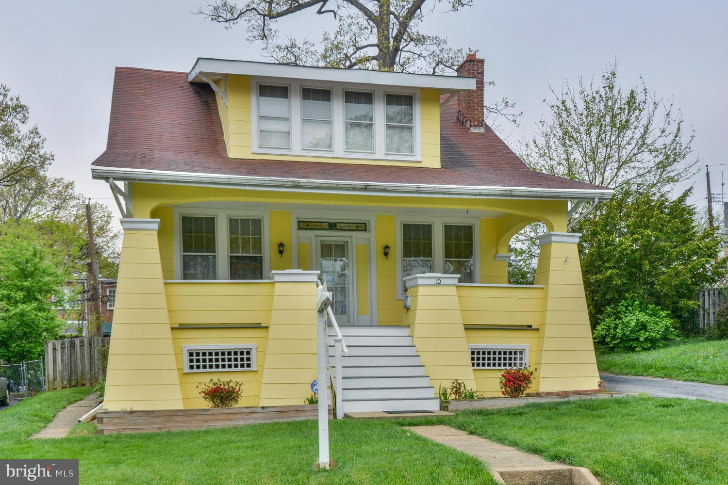 10 Mallow Hill Road Baltimore, MD 21229 - Photo 1 of 30 a front view of a house with a yard