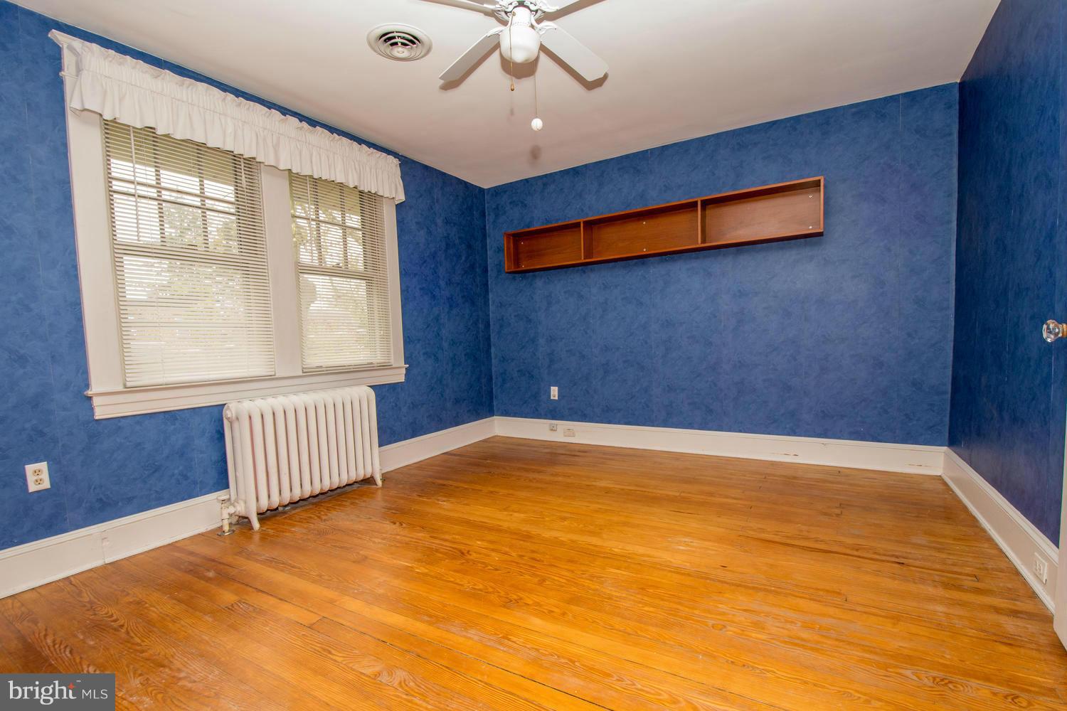 10 Mallow Hill Road Baltimore, MD 21229 - Photo 21 of 30 a view of an empty room with a window