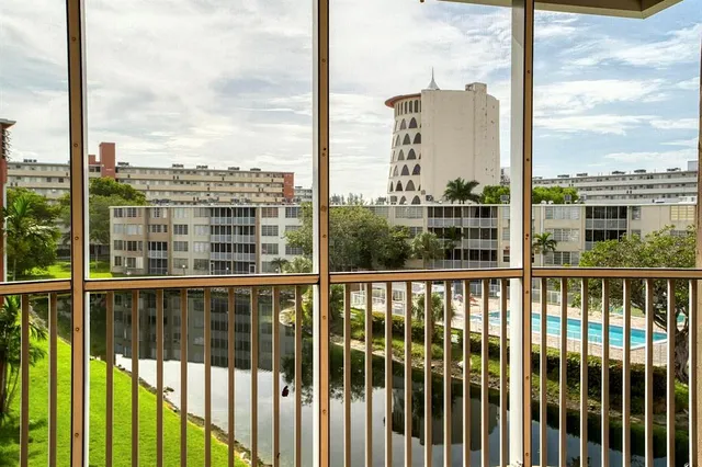 a view of swimming pool from a balcony