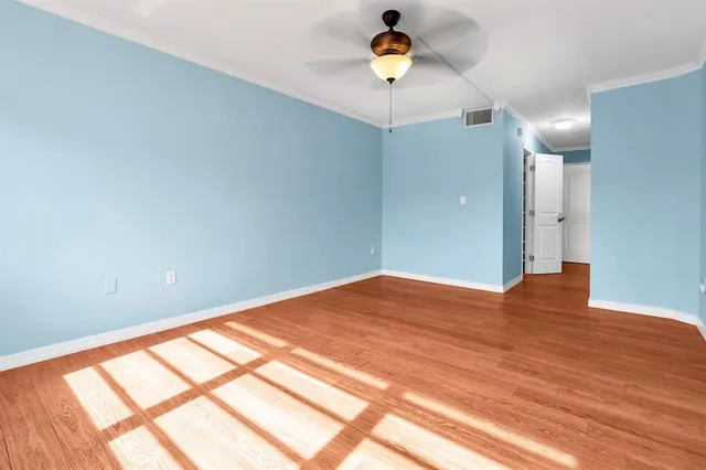 a bathroom with a granite countertop sink mirror and a bathtub
