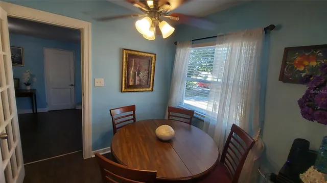 a view of a livingroom with furniture and window