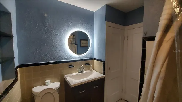 a bathroom with a sink and a toilet