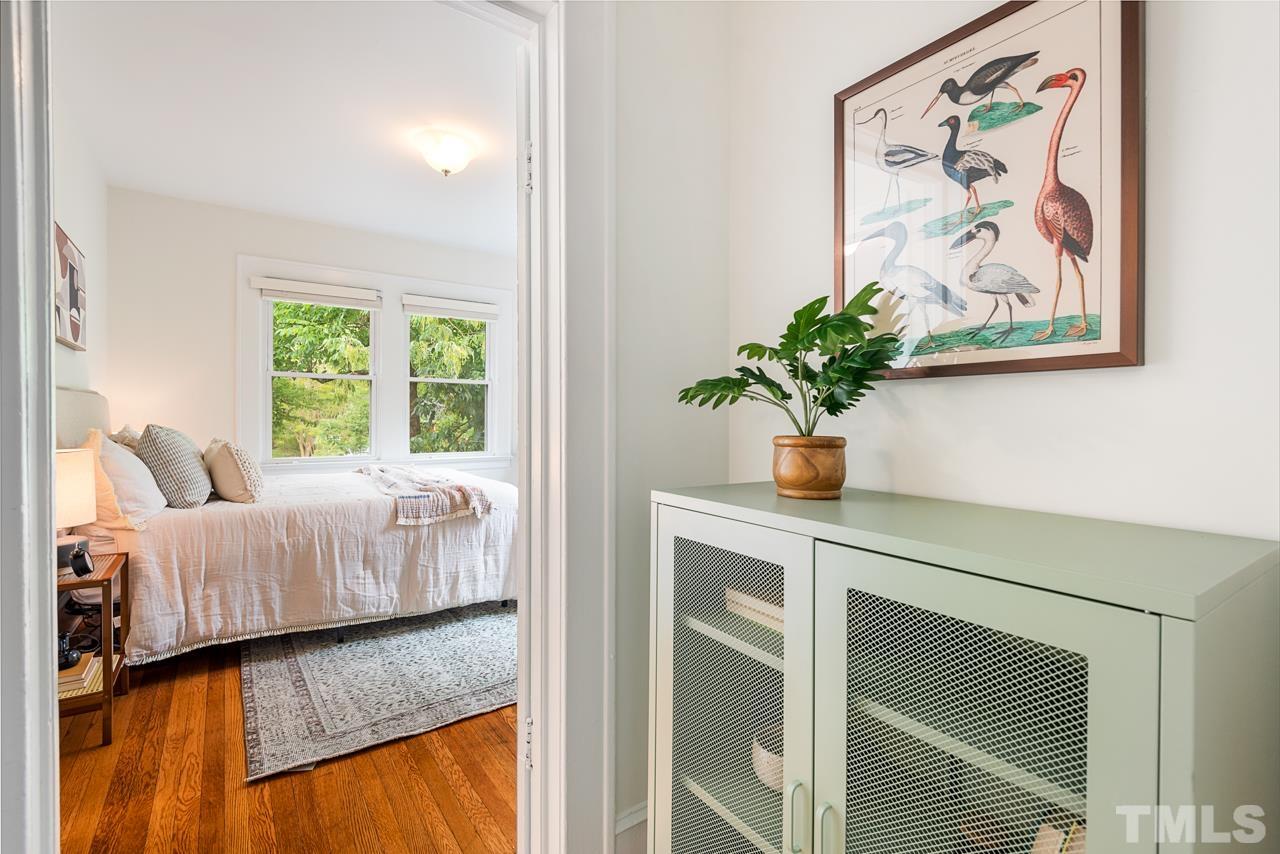 2201 University Drive Durham, NC 27707 - Photo 21 of 43 a living room with furniture and a potted plant