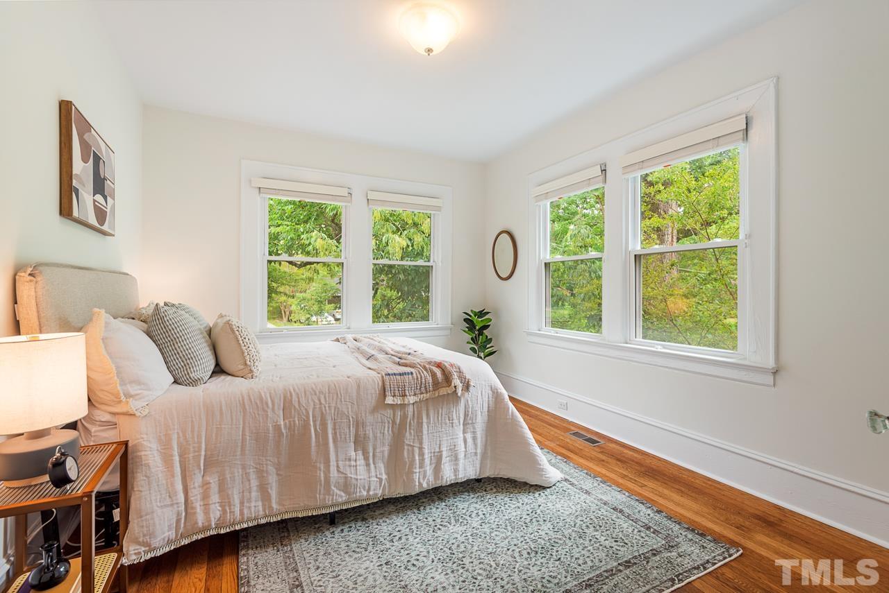 2201 University Drive Durham, NC 27707 - Photo 22 of 43 a bedroom with a bed and window