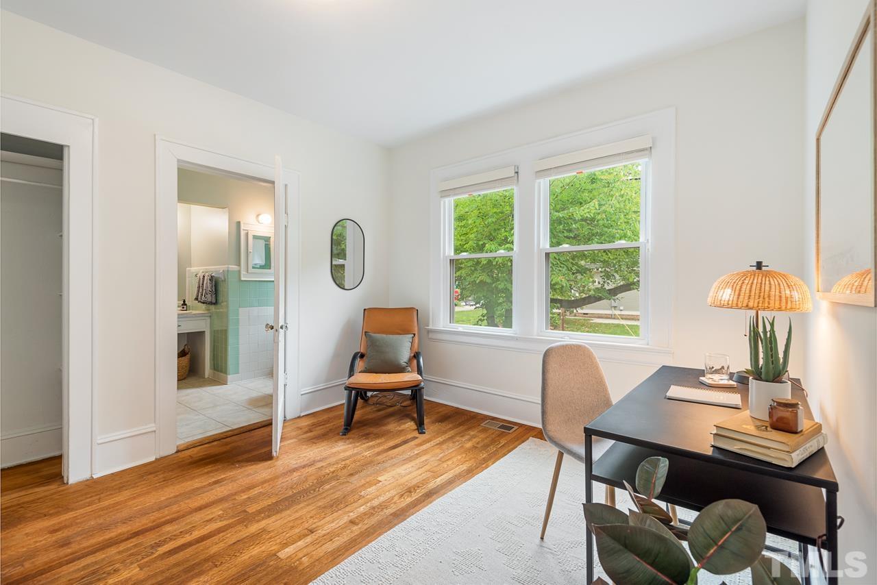 2201 University Drive Durham, NC 27707 - Photo 27 of 43 a workspace with furniture and a window