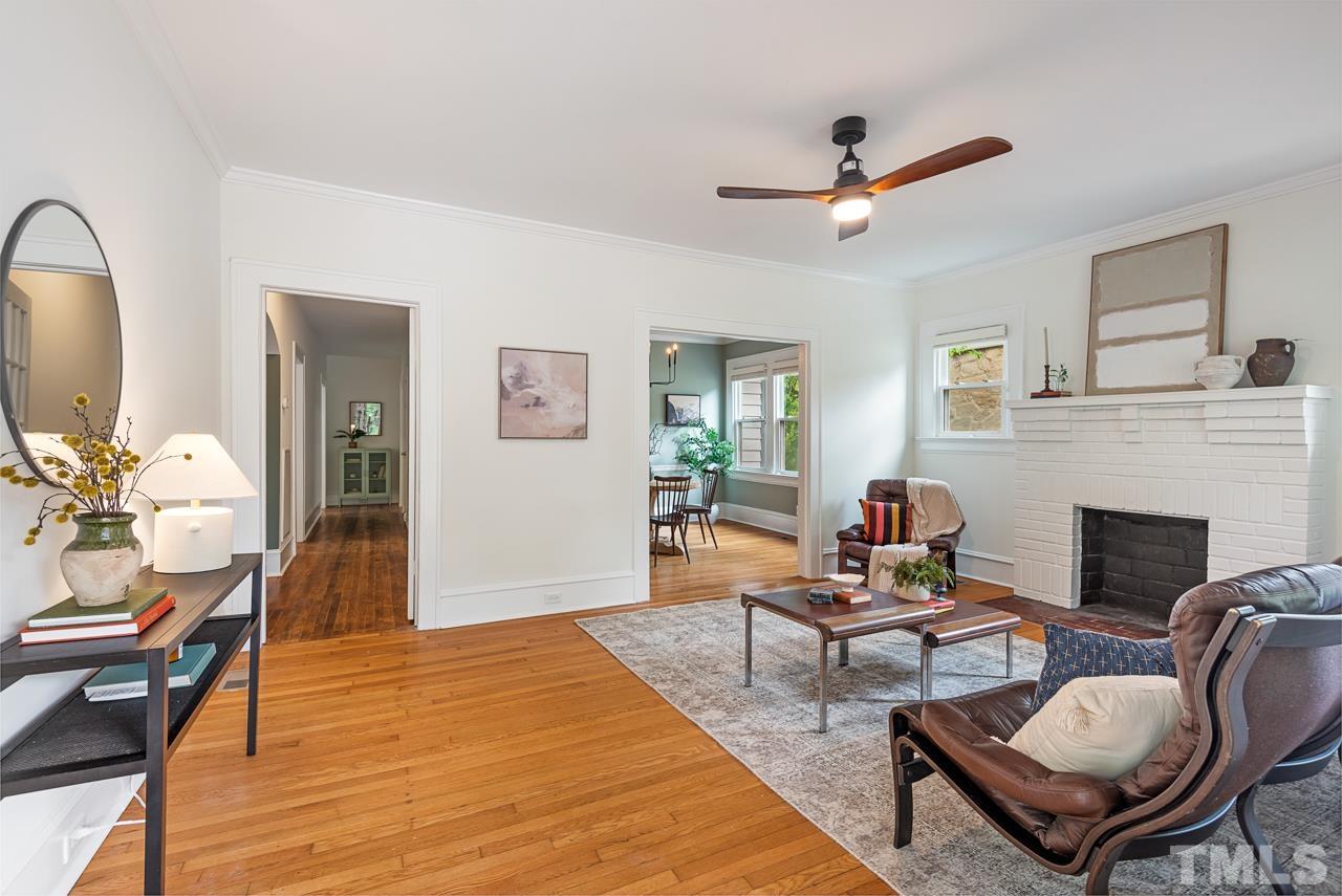 2201 University Drive Durham, NC 27707 - Photo 3 of 43 a living room with furniture and a fireplace