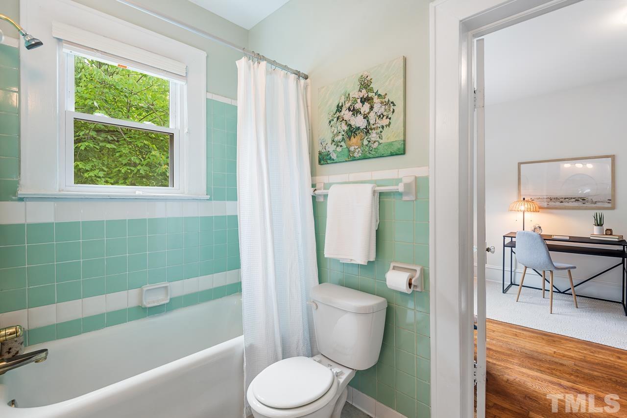 2201 University Drive Durham, NC 27707 - Photo 31 of 43 a bathroom with a toilet and a bathtub