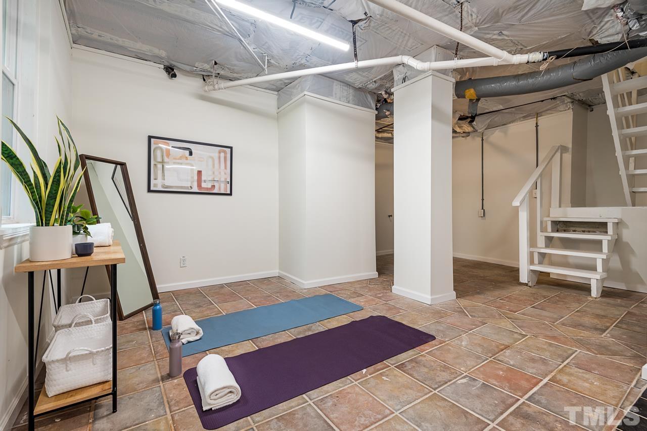 2201 University Drive Durham, NC 27707 - Photo 36 of 43 a view of an empty room with wooden floor
