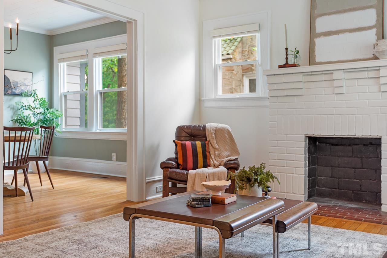 2201 University Drive Durham, NC 27707 - Photo 7 of 43 a living room with furniture and a fireplace