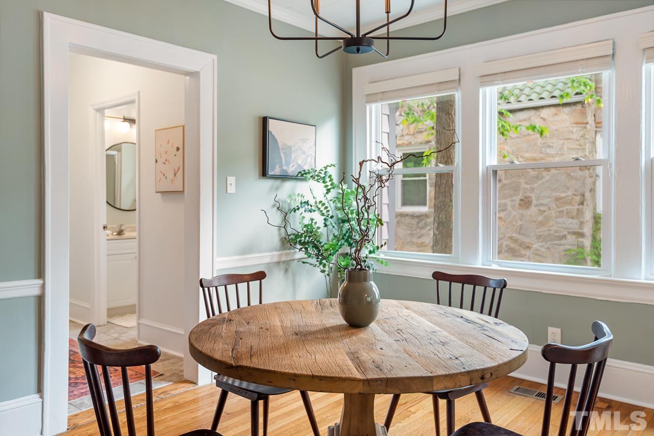 2201 University Drive Durham, NC 27707 - Photo 9 of 43 a view of a dining room with furniture window and wooden floor