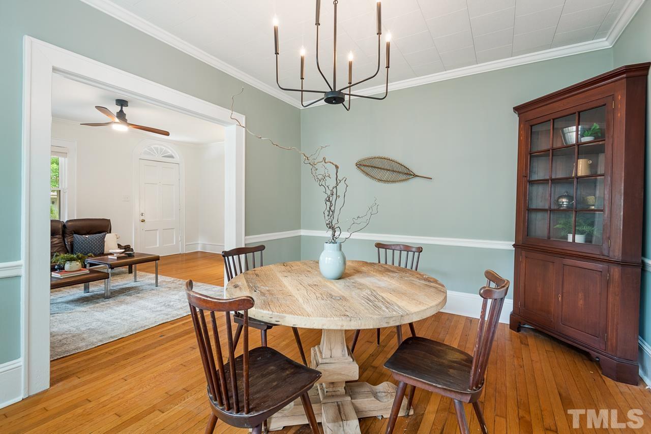 2201 University Drive Durham, NC 27707 - Photo 10 of 43 a view of a dining room with furniture and wooden floor