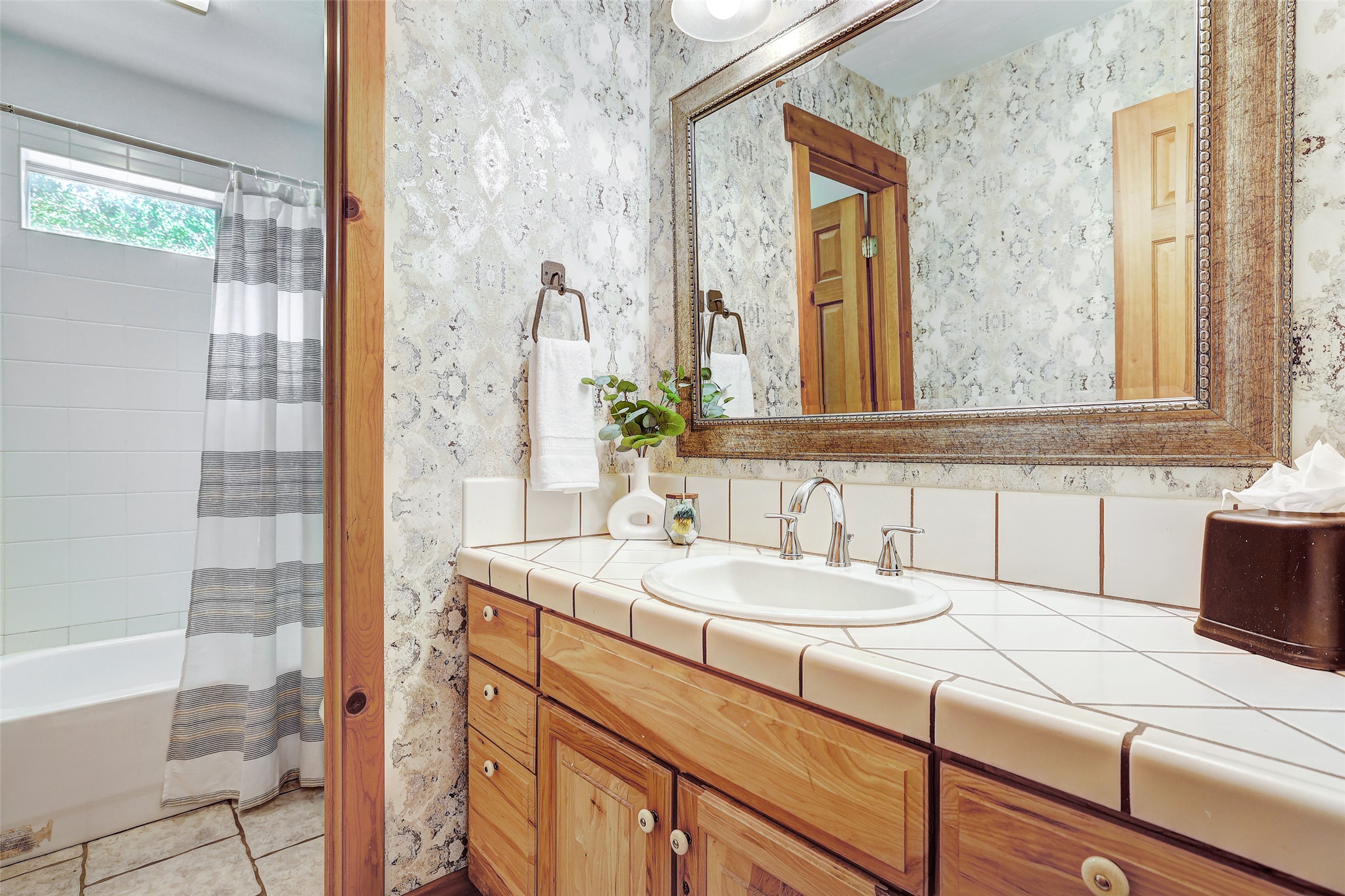 125 Kyle Lane Georgetown, TX 78633 - Photo 24 of 34 Full bathroom featuring vanity, shower / tub combo, and light tile patterned flooring