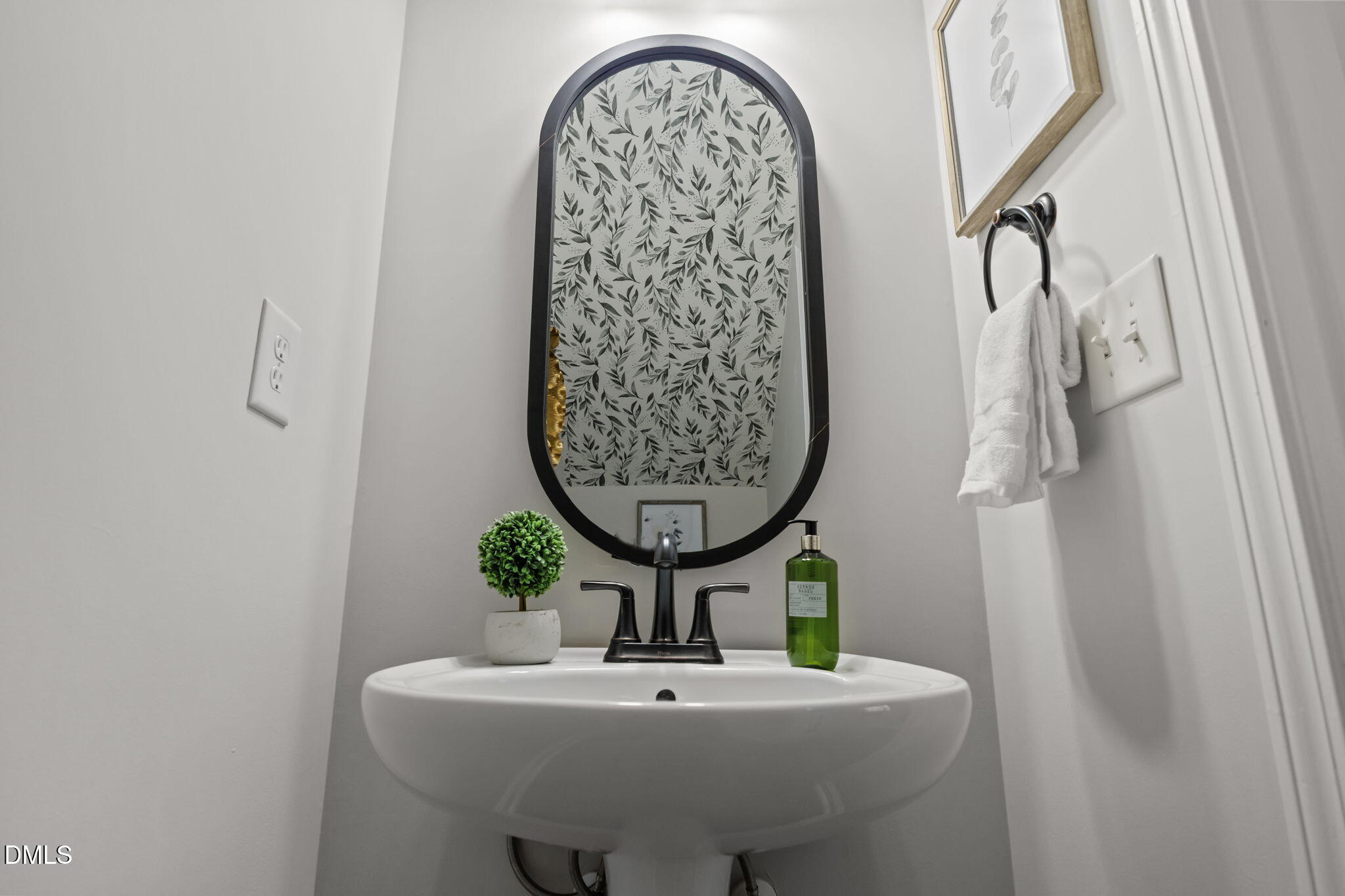 1003 Red Hat Lane Durham, NC 27713 - Photo 32 of 60 a bathroom with a sink and a mirror