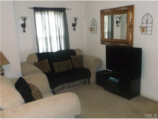 2204 Tucca Way Raleigh, NC 27604 - Photo 10 of 17 a living room with furniture and a window