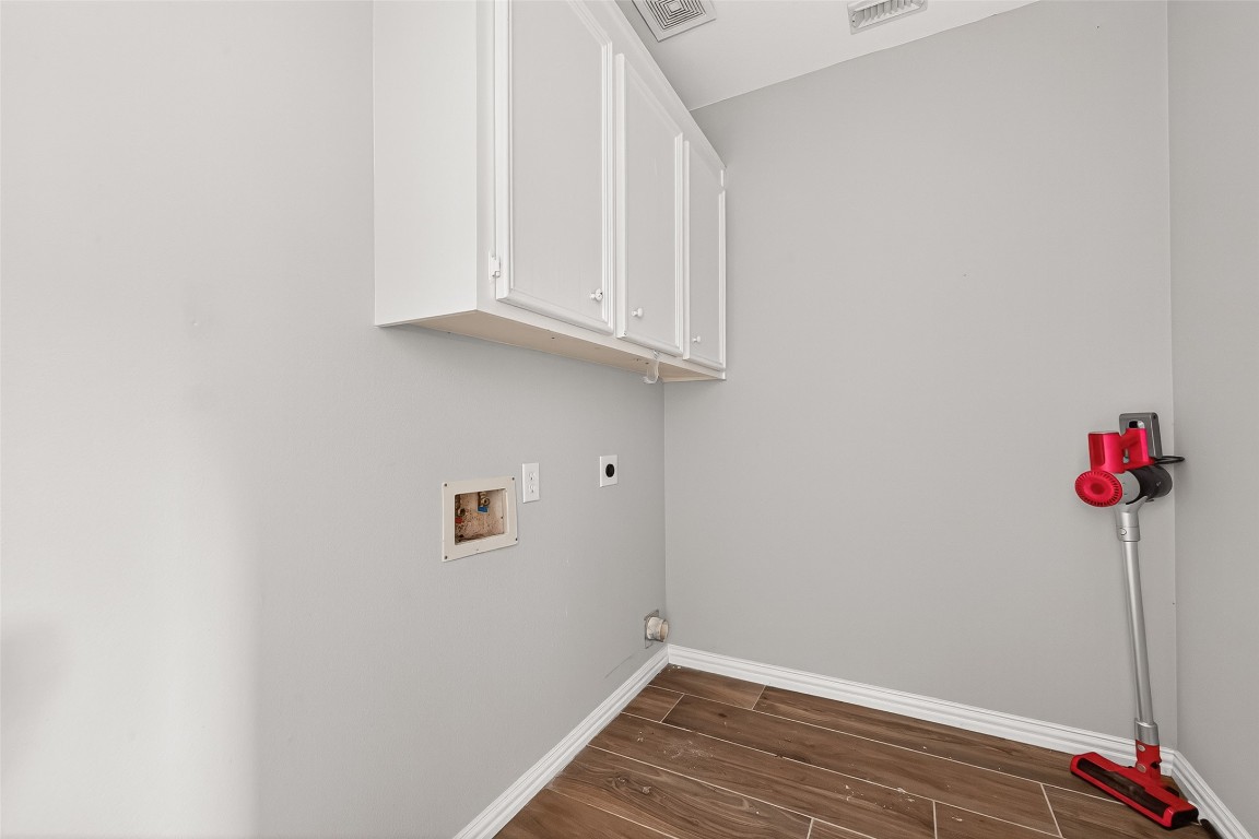 25507 Lyon Springs Court Spring, TX 77373 - Photo 19 of 39 a view of a room with wooden floor