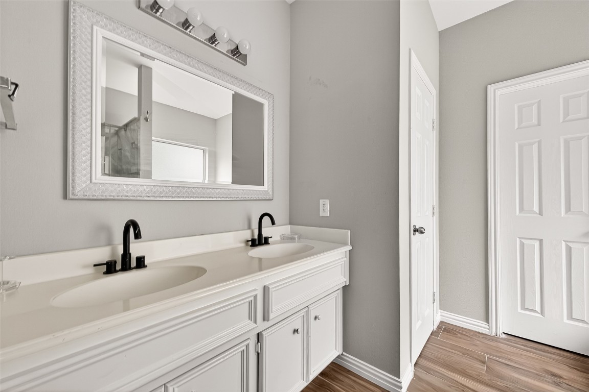 25507 Lyon Springs Court Spring, TX 77373 - Photo 23 of 39 a bathroom with a sink and a mirror