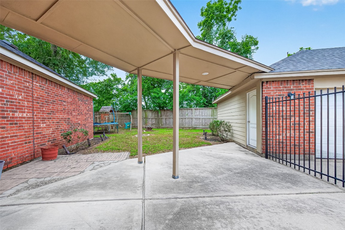 25507 Lyon Springs Court Spring, TX 77373 - Photo 35 of 39 a view of a backyard with a garden