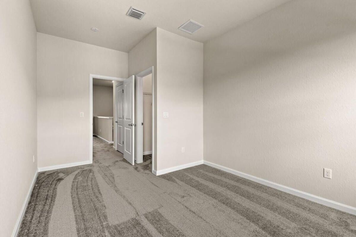 1805 Southeast Ocean Cove Way Stuart, FL 34996 - Photo 17 of 23 a view of a room with wooden floor