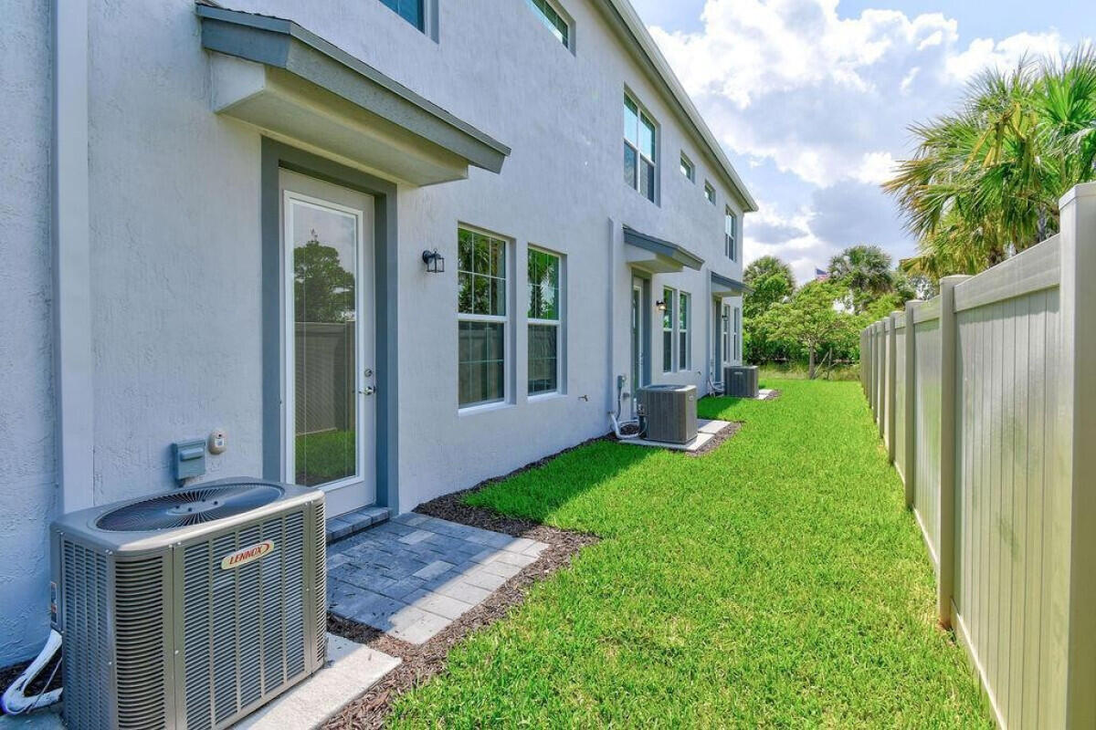 1805 Southeast Ocean Cove Way Stuart, FL 34996 - Photo 22 of 23 a house view with a backyard space