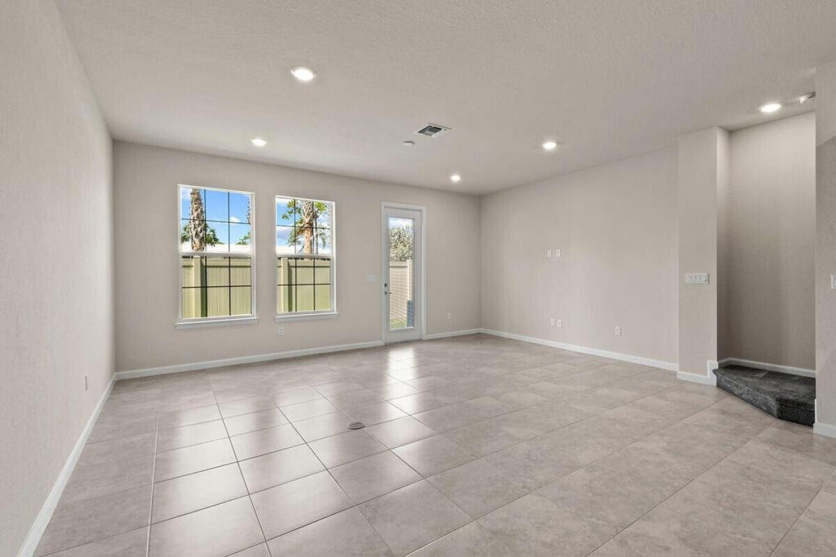 1805 Southeast Ocean Cove Way Stuart, FL 34996 - Photo 6 of 23 a view of an empty room with a window