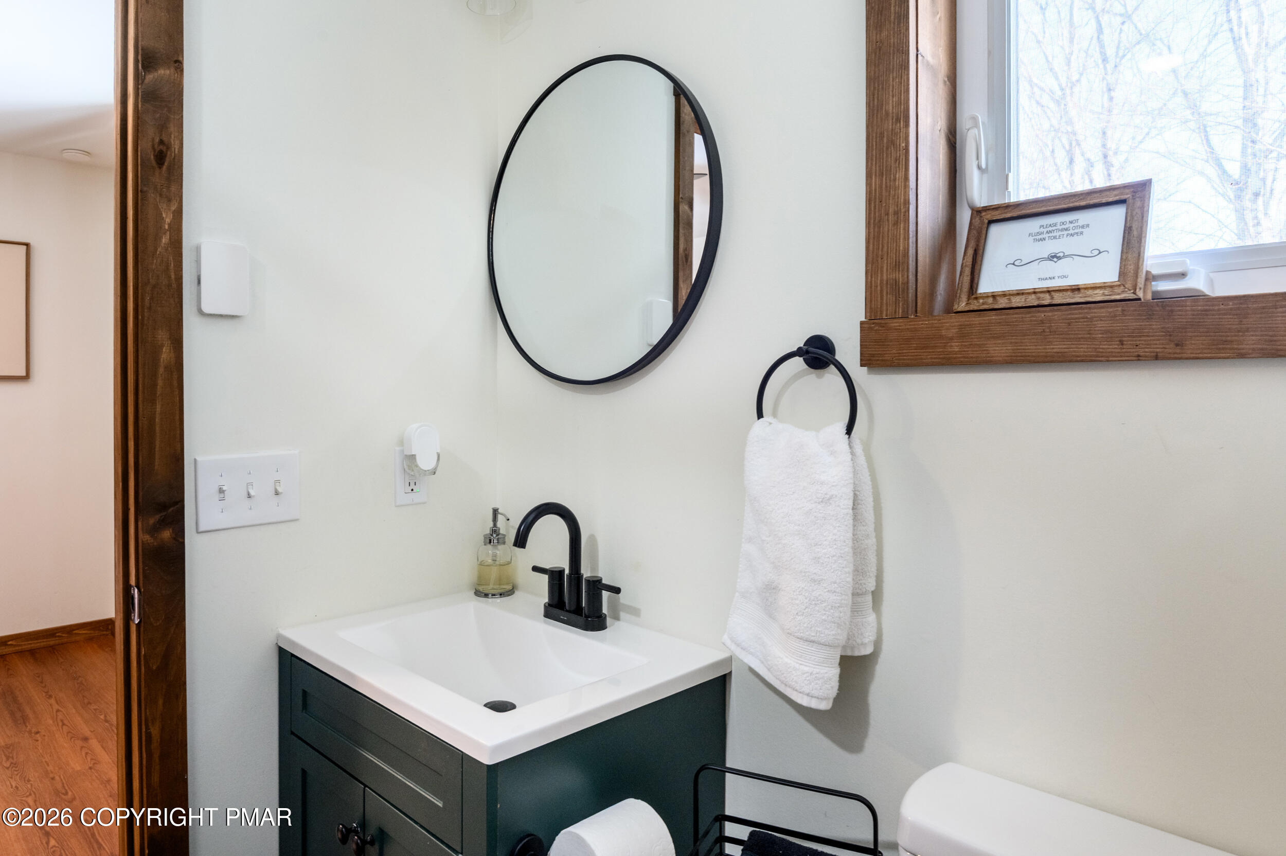 2206 Chatham Drive Bushkill, PA 18324 - Photo 13 of 45 a bathroom with a toilet a sink and a mirror