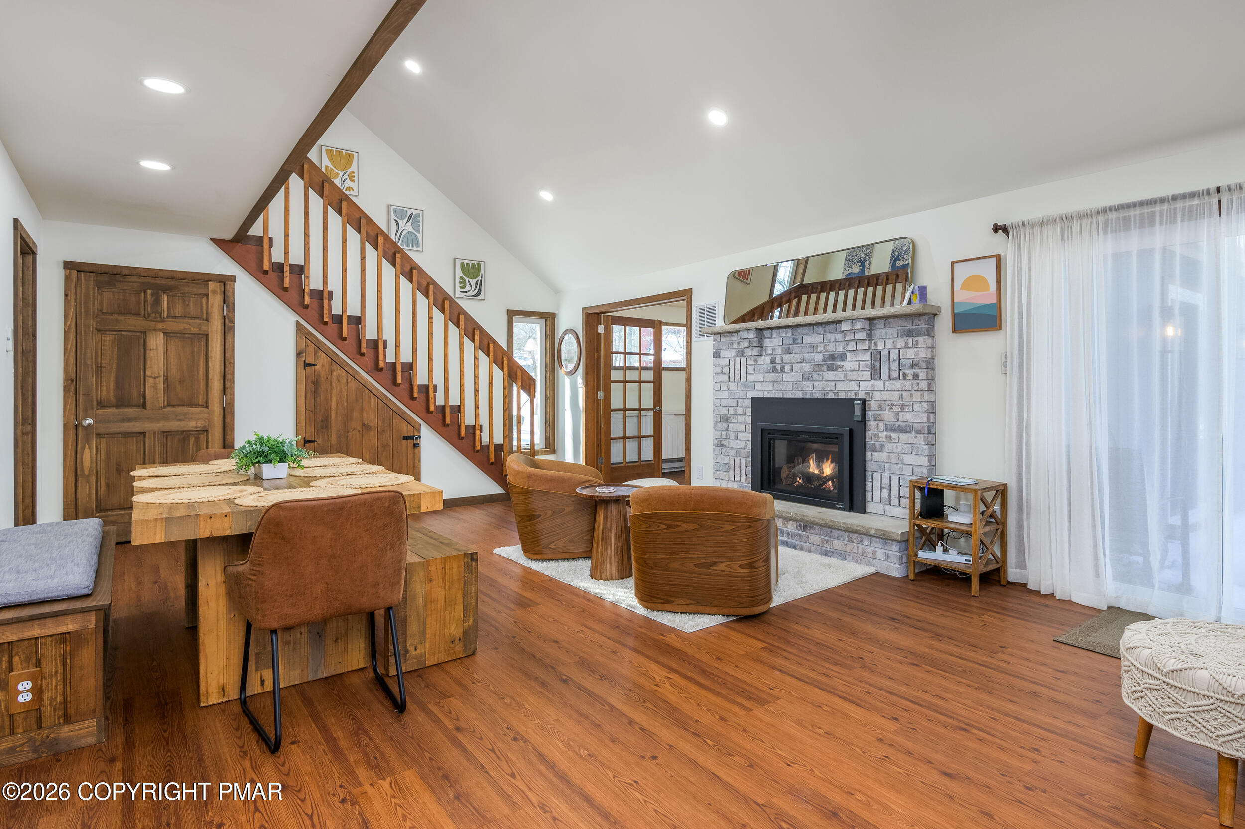 2206 Chatham Drive Bushkill, PA 18324 - Photo 2 of 45 a living room with furniture and a fireplace