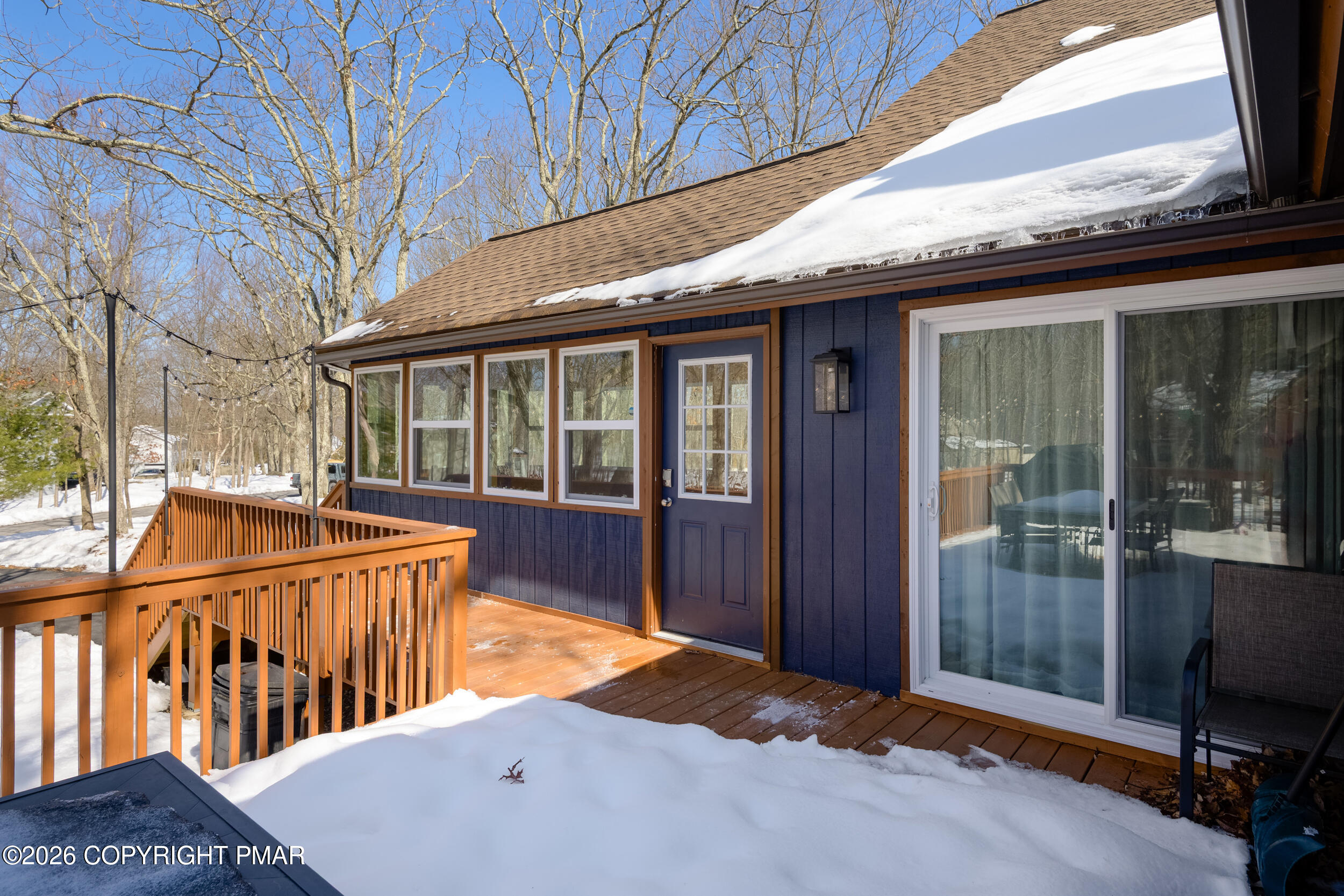 2206 Chatham Drive Bushkill, PA 18324 - Photo 32 of 45 a balcony with table and chairs