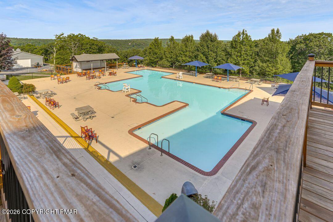 2206 Chatham Drive Bushkill, PA 18324 - Photo 42 of 45 a view of a swimming pool with a patio