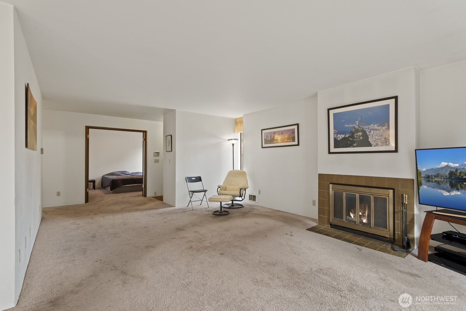 2510 Rucker Avenue, Unit 1 Everett, WA 98201 - Photo 23 of 34 a living room with furniture and a fireplace
