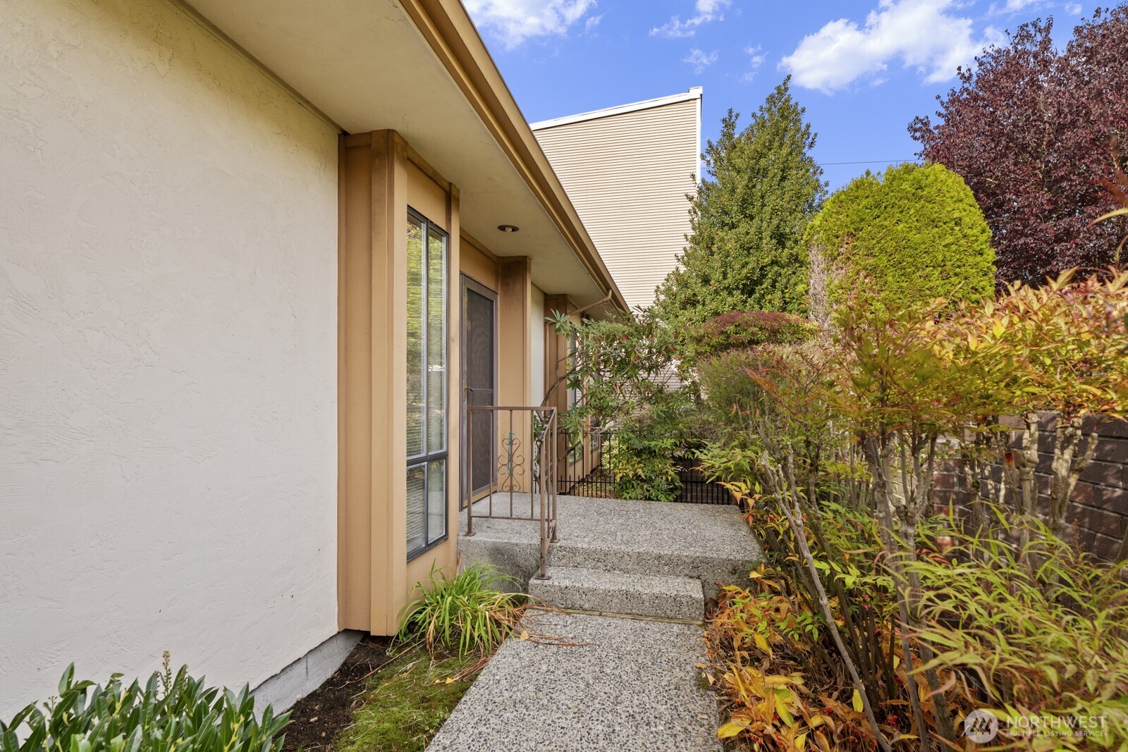 2510 Rucker Avenue, Unit 1 Everett, WA 98201 - Photo 5 of 34 a view of a pathway with flower plants