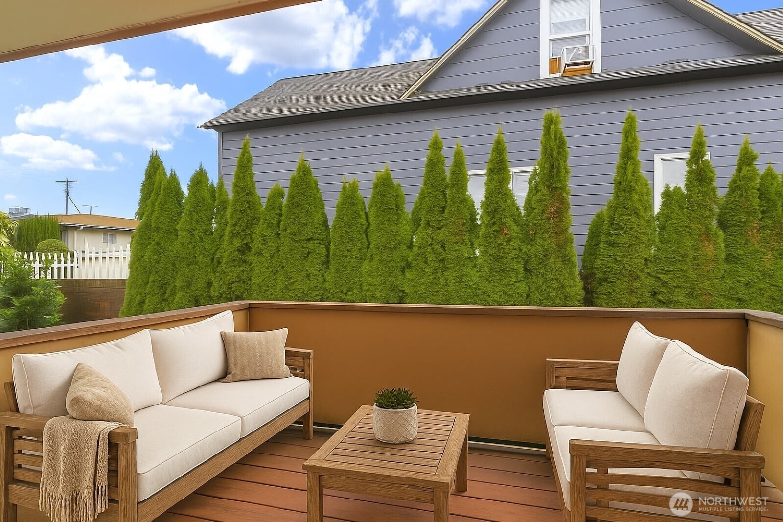 2510 Rucker Avenue, Unit 1 Everett, WA 98201 - Photo 7 of 34 a roof deck with couches and potted plants