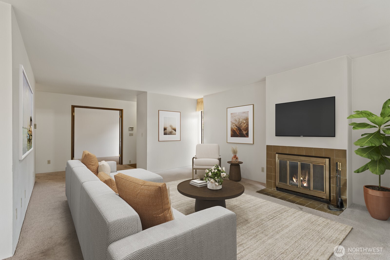 2510 Rucker Avenue, Unit 1 Everett, WA 98201 - Photo 8 of 34 a living room with fireplace furniture and a flat screen tv