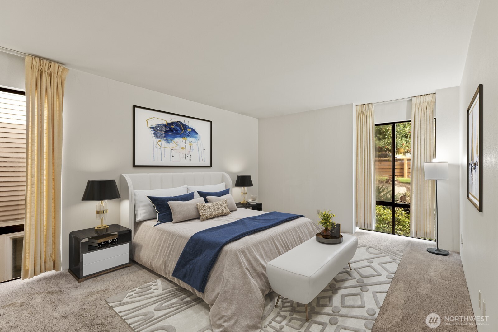 2510 Rucker Avenue, Unit 1 Everett, WA 98201 - Photo 10 of 34 a bedroom with a large bed and a chandelier