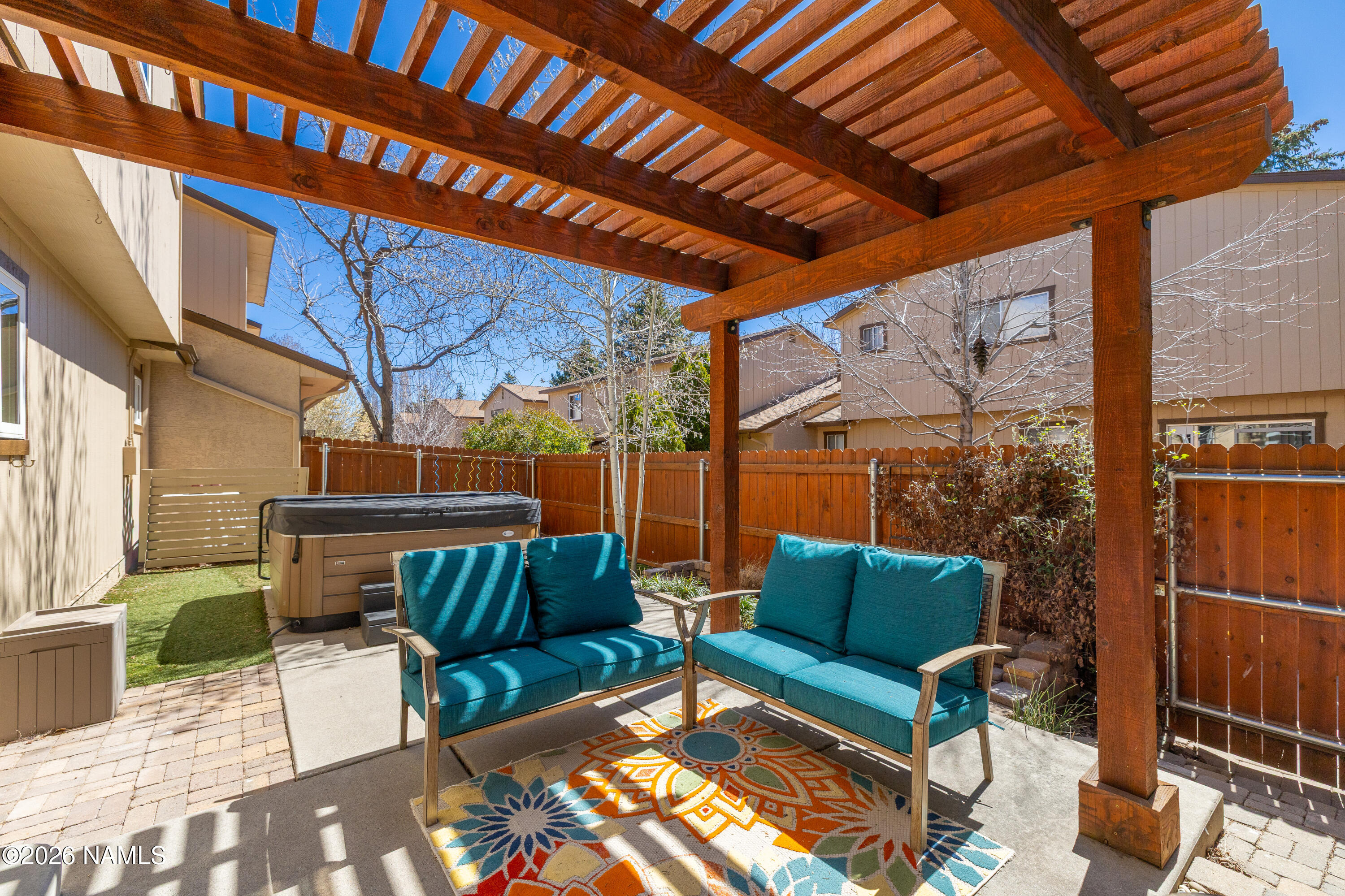 2536 East Eva Loop Flagstaff, AZ 86004 - Photo 29 of 37 a outdoor living space with patio furniture and a rug